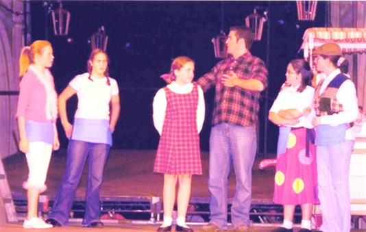 Pred Pringle introduces Poppy to the rest of the Dazzlers